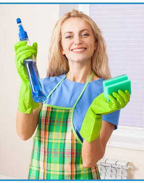 domestic cleaner looking happy